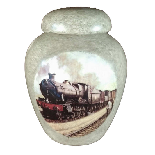 A beautiful small-sized cremation ceramic urn with a decoration of a steam train with a granite-look finish.