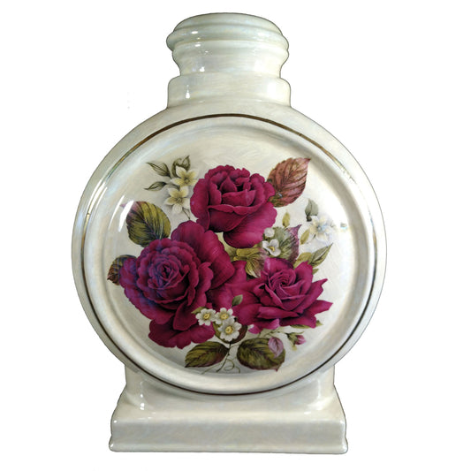 A beautiful large sized cremation ceramic urn with a decoration of three roses and a gold highlight on the outer edge. Front View