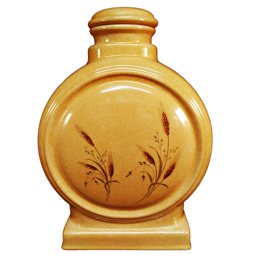 A beautiful large sized cremation ceramic urn with a decoration of stems of wheat with an autumn lustre finish.