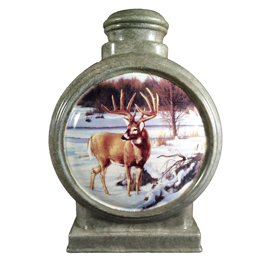 A beautiful large sized cremation ceramic urn with a decoration of a wintery scene and a buck white-tailed deer in brush area with a granite-look finish.
