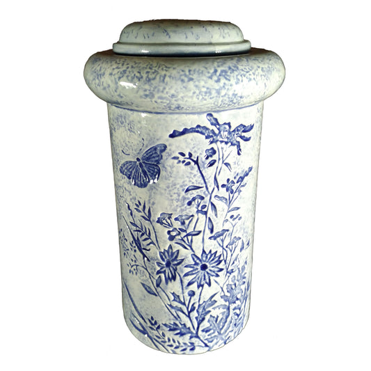 A beautiful urn with butterfly and floral pattern etched into the body of a cremation ceramic urn. This urn is a wonderful shade of blue.