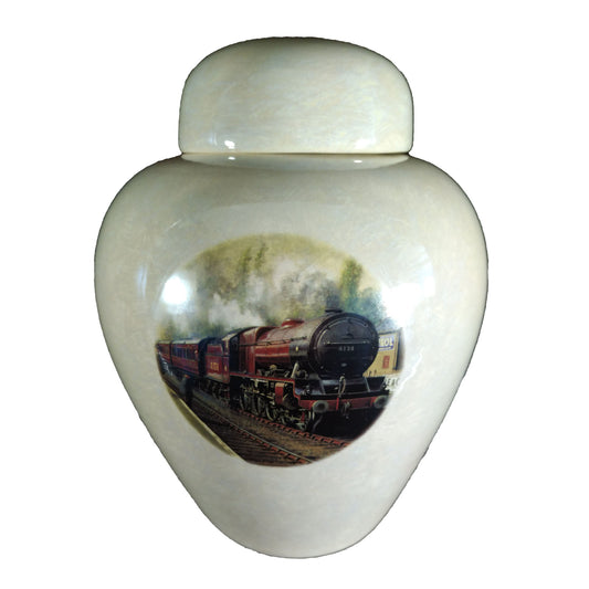 A beautiful medium sized cremation ceramic urn with a decoration of a scene of a red steam engine and train cars with a mother-of-pearl finish.